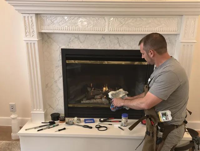 Plantation Chimney Sweep performing fireplace maintenance in Plantation, FL
